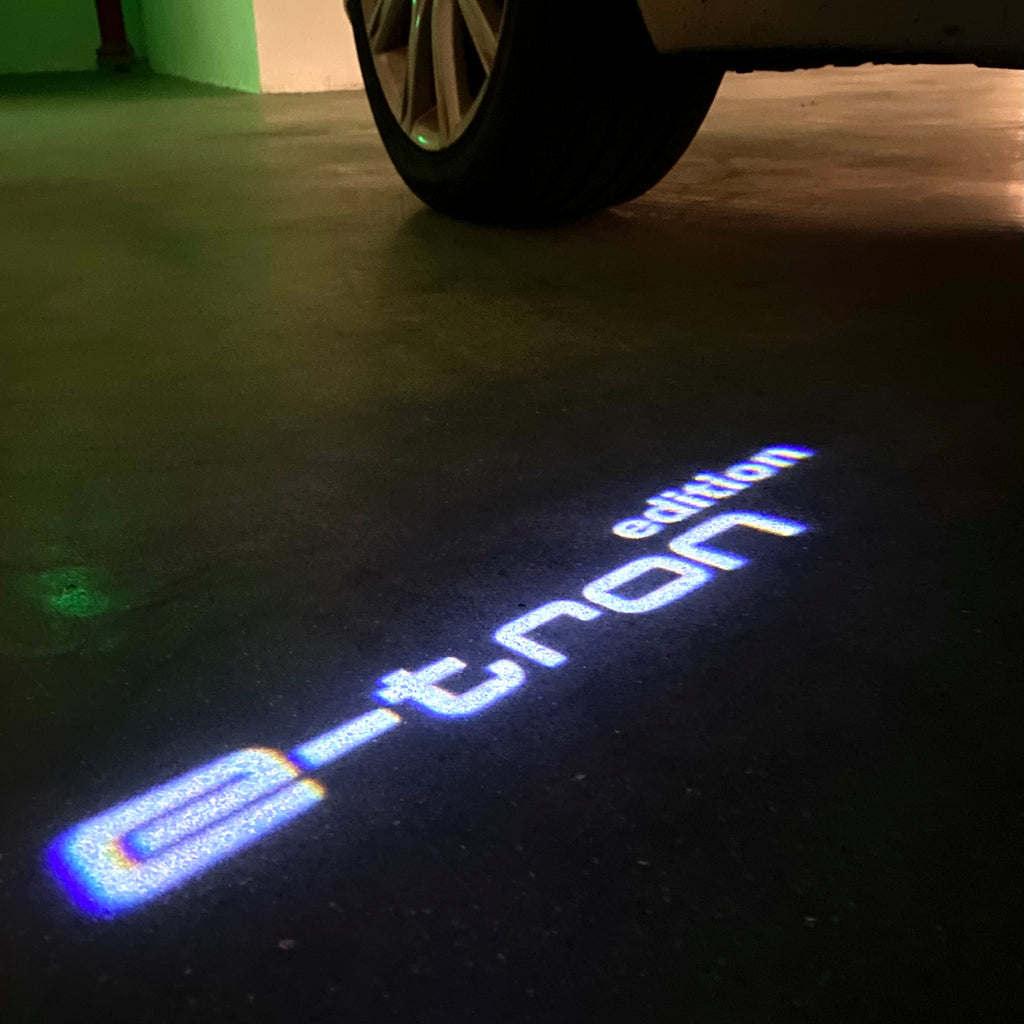 AUDI LOGO PROJECTOT LIGHTS Nr.19 (الكمية 1 = 2 Logo Films /2 أضواء الباب)