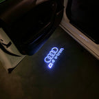 LUCES DE PROYECTOR LOGO AUDI No 120 (cantidad 1 = 2 películas con logotipo / 2 luces de puerta)