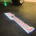 AUDI LOGO PROJECTOT LIGHTS Nr.297 (الكمية 1 = 2 Logo Films /2 أضواء الباب)