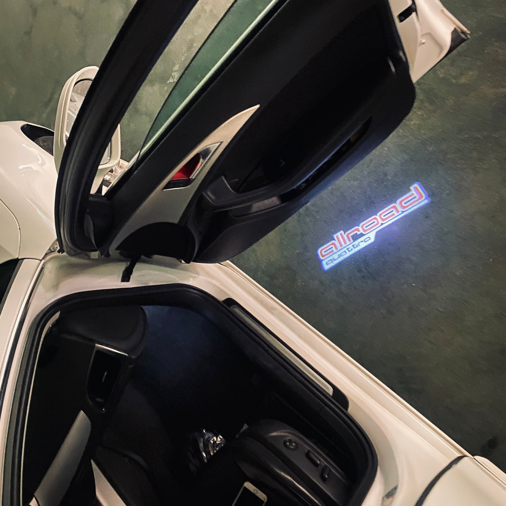 AUDI LOGO PROJECTOT LIGHTS Nr.297 (الكمية 1 = 2 Logo Films /2 أضواء الباب)