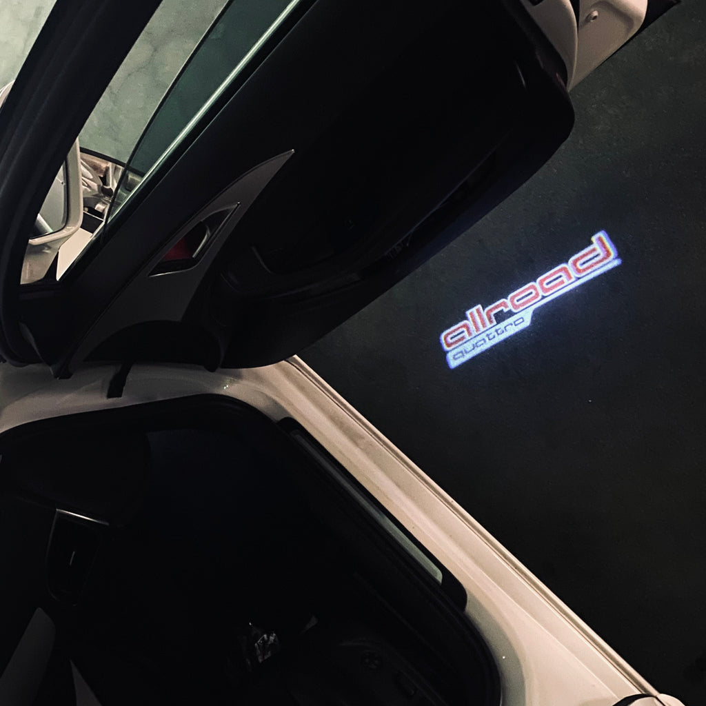 AUDI LOGO PROJECTOT LIGHTS Nr.297 (الكمية 1 = 2 Logo Films /2 أضواء الباب)