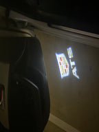 AUDI LOGO PROJECTOT LIGHTS Nr.19 (الكمية 1 = 2 Logo Films /2 أضواء الباب)