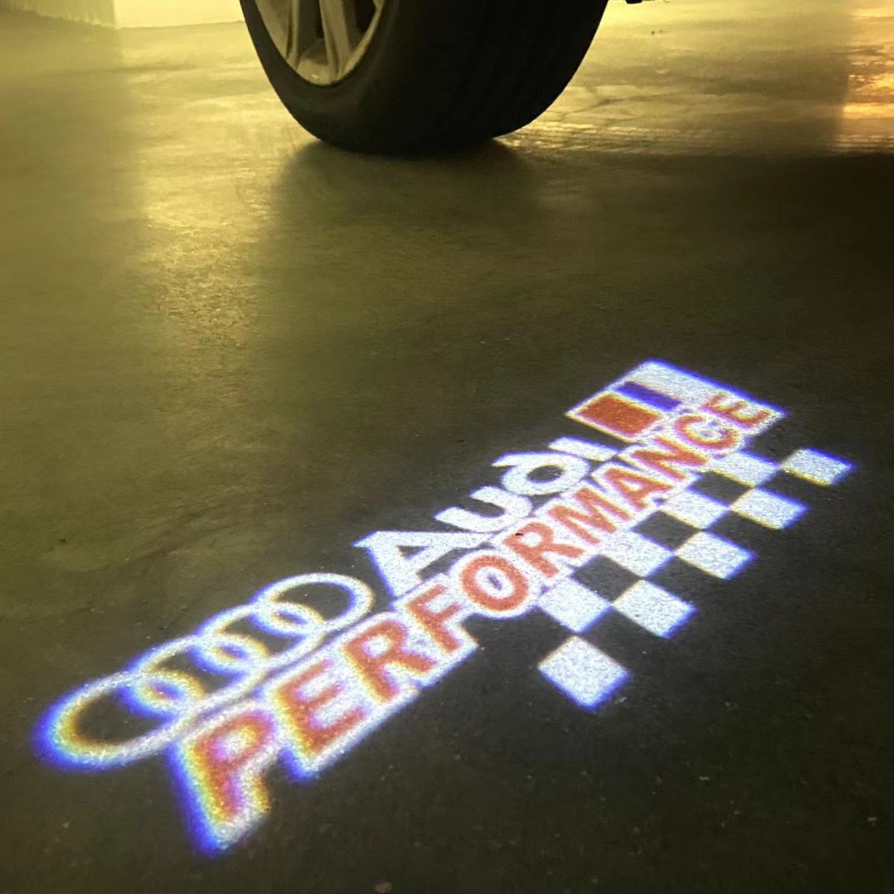AUDI LOGO PROJECTOT LIGHTS Nr.120 (الكمية 1 = 2 Logo Films /2 أضواء الباب)