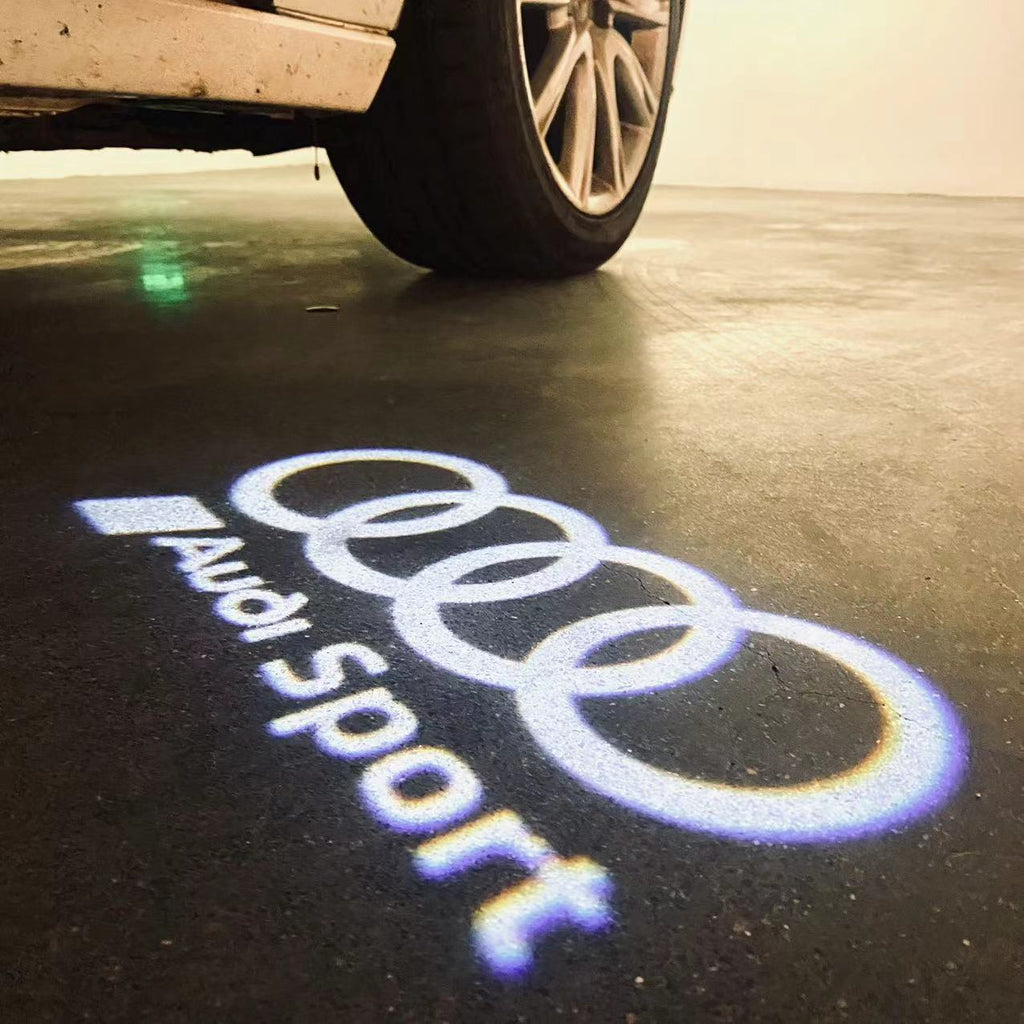 AUDI LOGO PROJECTOT LIGHTS Nr.120 (Menge 1 = 2 Logofolien /2 Türleuchten)
