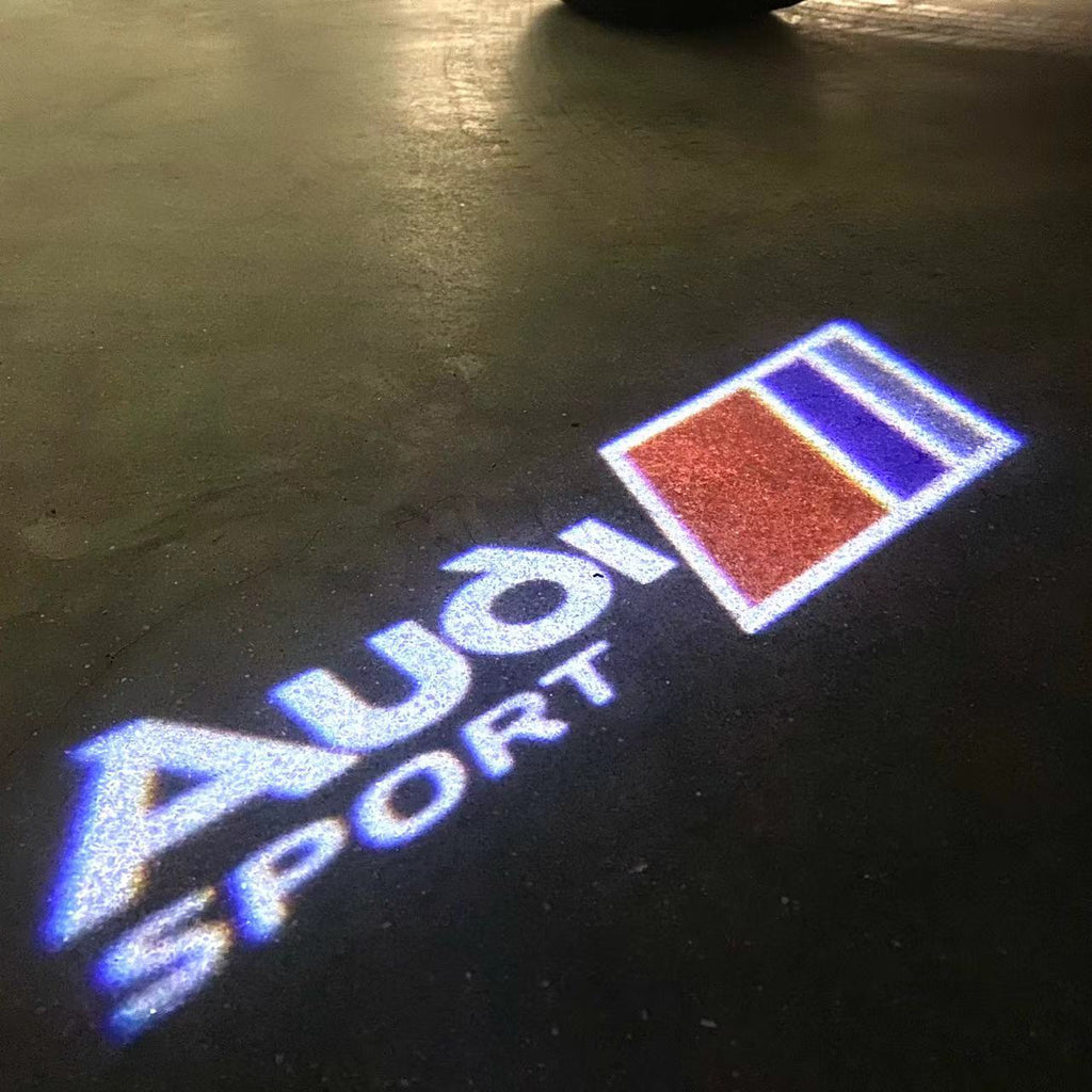 LUCES DE PROYECTOR LOGO AUDI No 120 (cantidad 1 = 2 películas con logotipo / 2 luces de puerta)