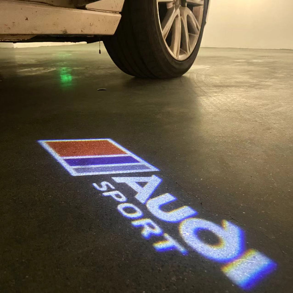 LUCES DE PROYECTOR LOGO AUDI No 120 (cantidad 1 = 2 películas con logotipo / 2 luces de puerta)