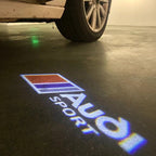 LUCES DE PROYECTOR LOGO AUDI No 120 (cantidad 1 = 2 películas con logotipo / 2 luces de puerta)