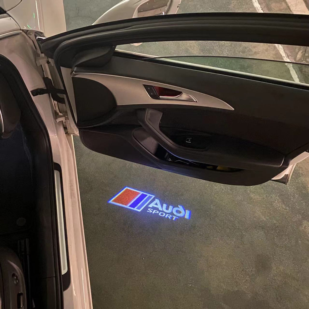 LUCES DE PROYECTOR LOGO AUDI No 120 (cantidad 1 = 2 películas con logotipo / 2 luces de puerta)