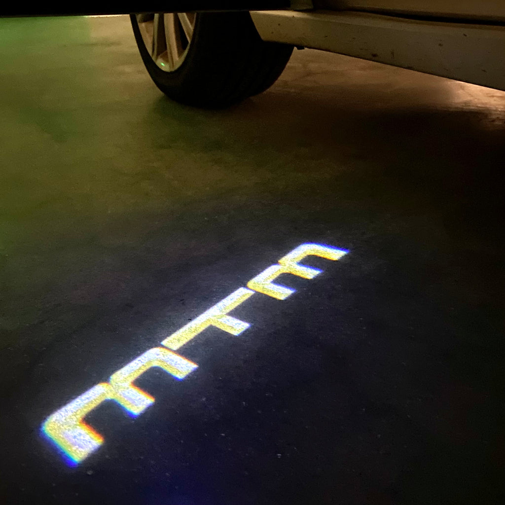 AUDI LOGO PROJECTOT LIGHTS Nr.86 (quantità 1 = 2 Logo Films /2 luci porta)