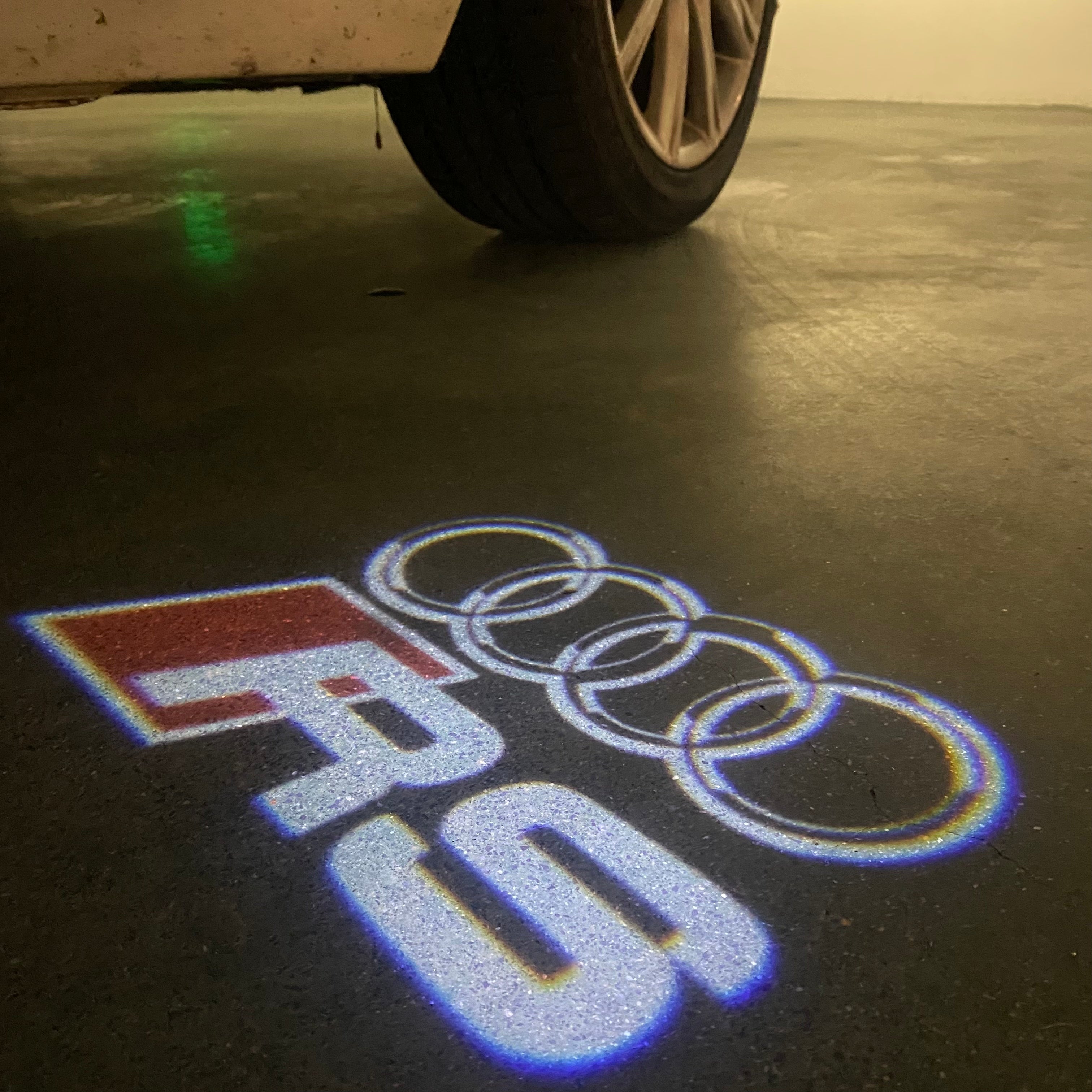 AUDI LOGO PROJECTOT LIGHTS Nr.120 (الكمية 1 = 2 Logo Films /2 أضواء الباب)