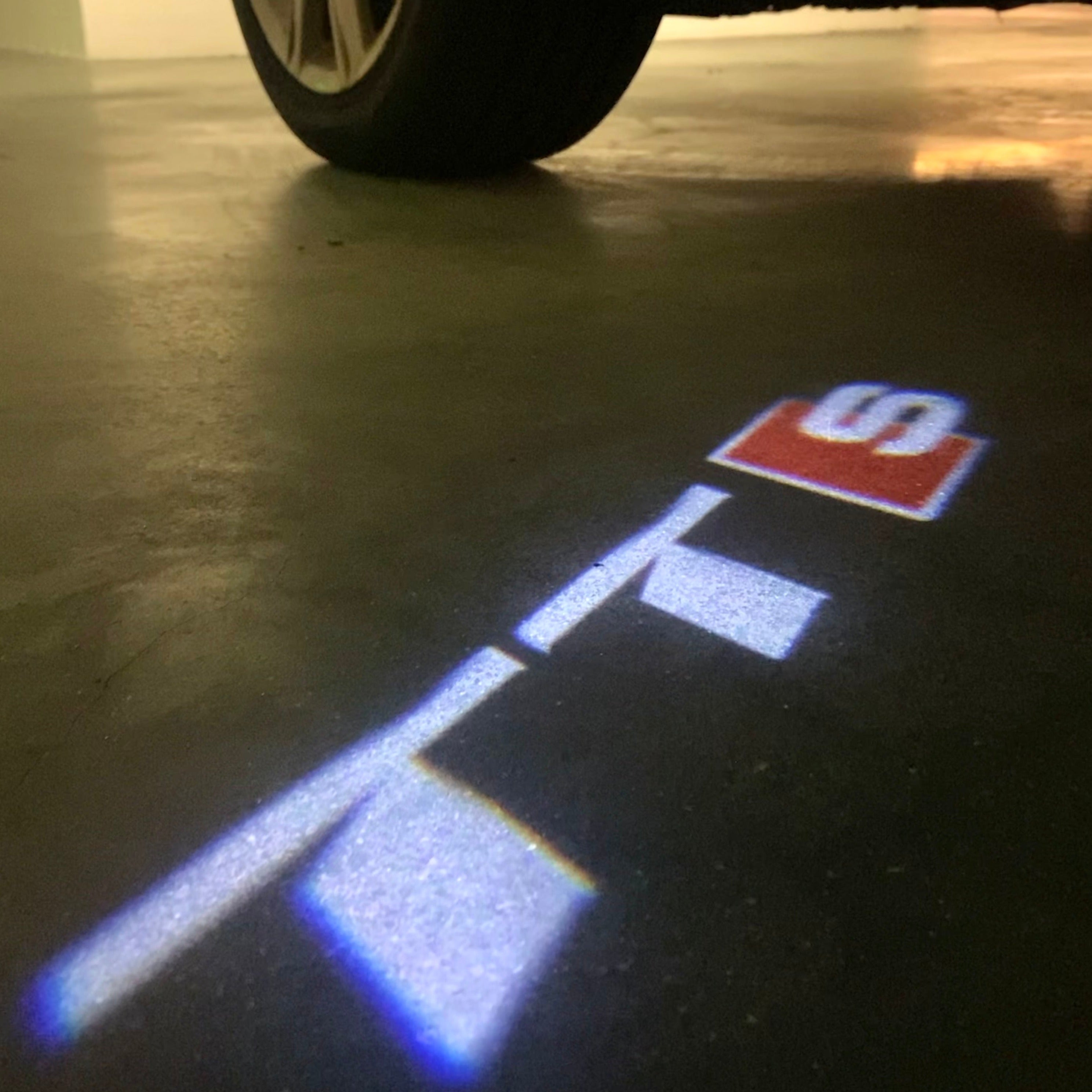 AUDI LOGO PROJECTOT LIGHTS Nr.120 (الكمية 1 = 2 Logo Films /2 أضواء الباب)