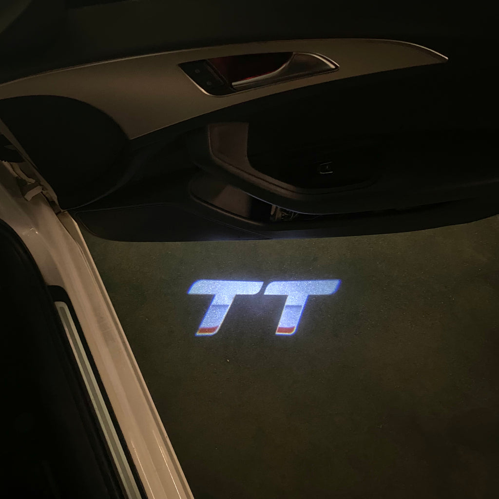 LUCES DE PROYECTOR LOGO AUDI No 120 (cantidad 1 = 2 películas con logotipo / 2 luces de puerta)