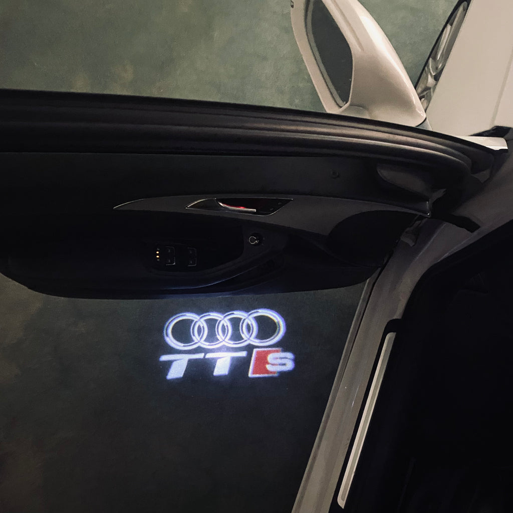 AUDI LOGO PROJECTOT LIGHTS Nr.120 (quantité 1 = 2 Logo Films /2 feux de porte)