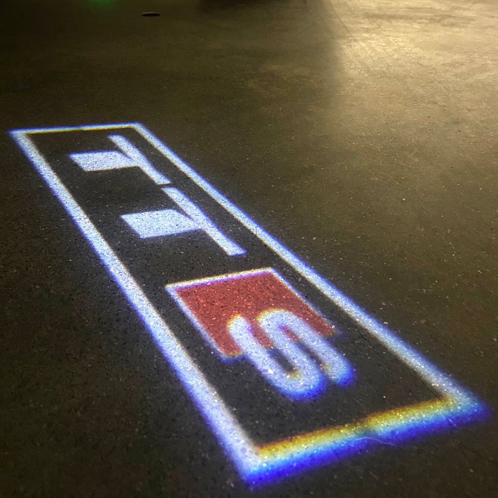 AUDI LOGO PROJECTOT LIGHTS Nr.120 (Menge 1 = 2 Logofolien /2 Türleuchten)
