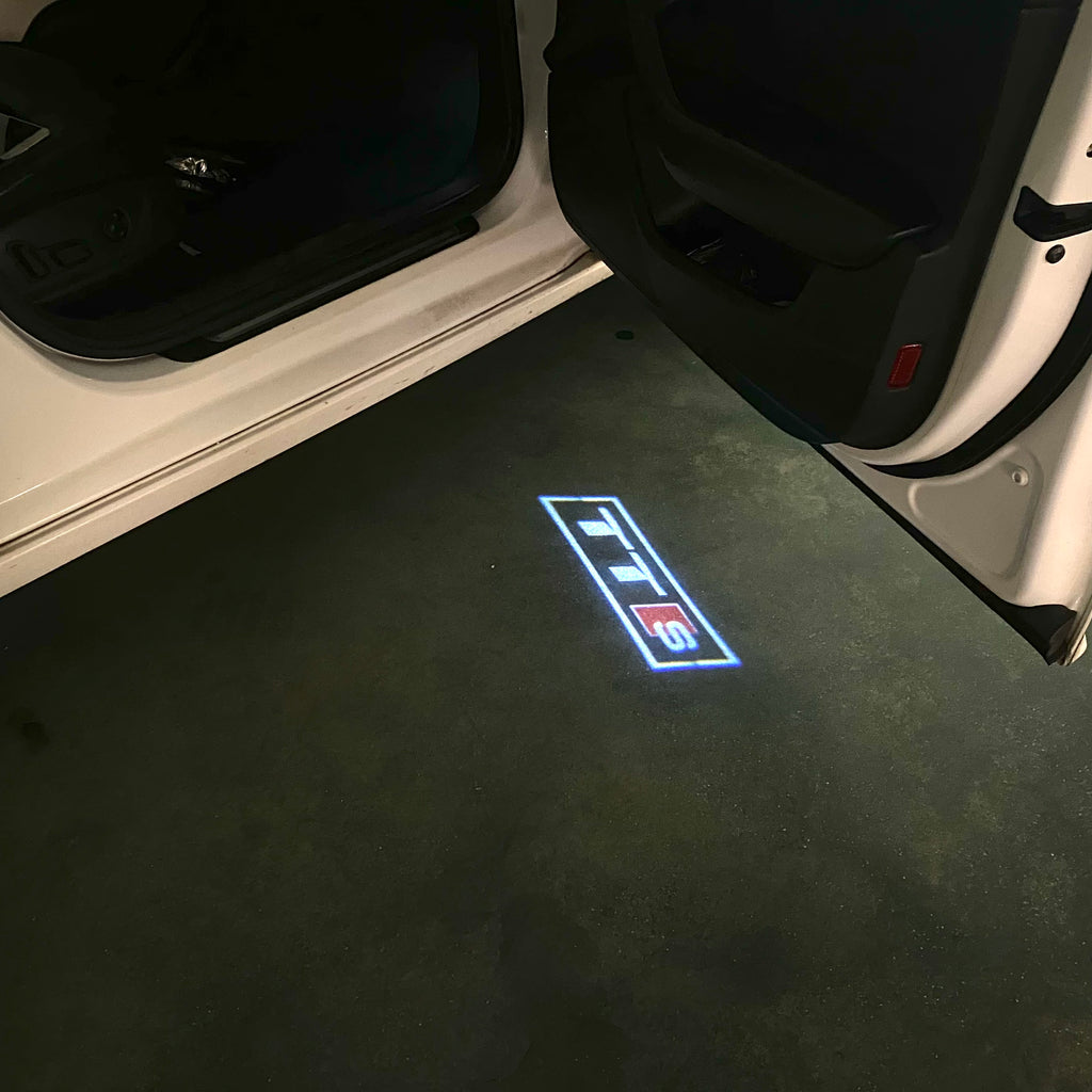 AUDI LOGO PROJECTOT LIGHTS Nr.120 (Menge 1 = 2 Logofolien /2 Türleuchten)