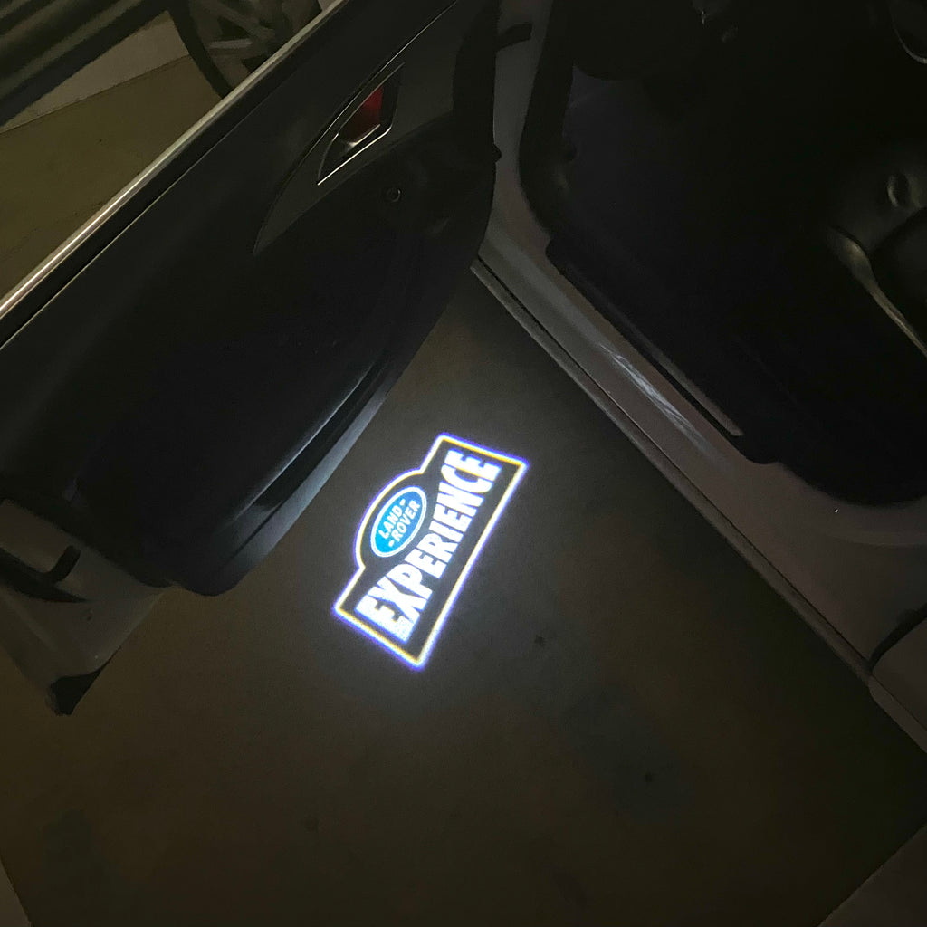 LUCI PROIETTORI LOGO Land Rover Nr.04 (quantità 1 = 1 set / 2 luci porta)