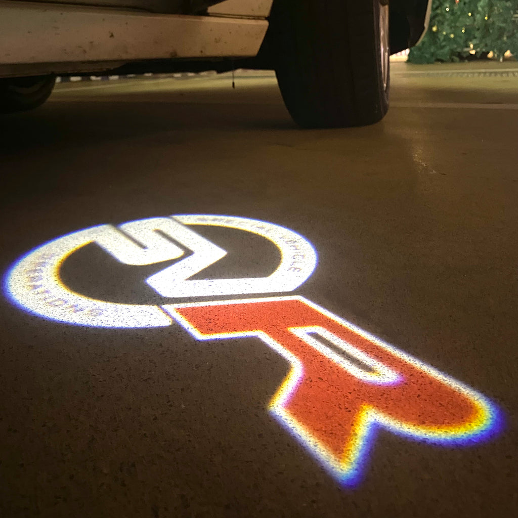 LUCI PROIETTORI LOGO Land Rover Nr.04 (quantità 1 = 1 set / 2 luci porta)