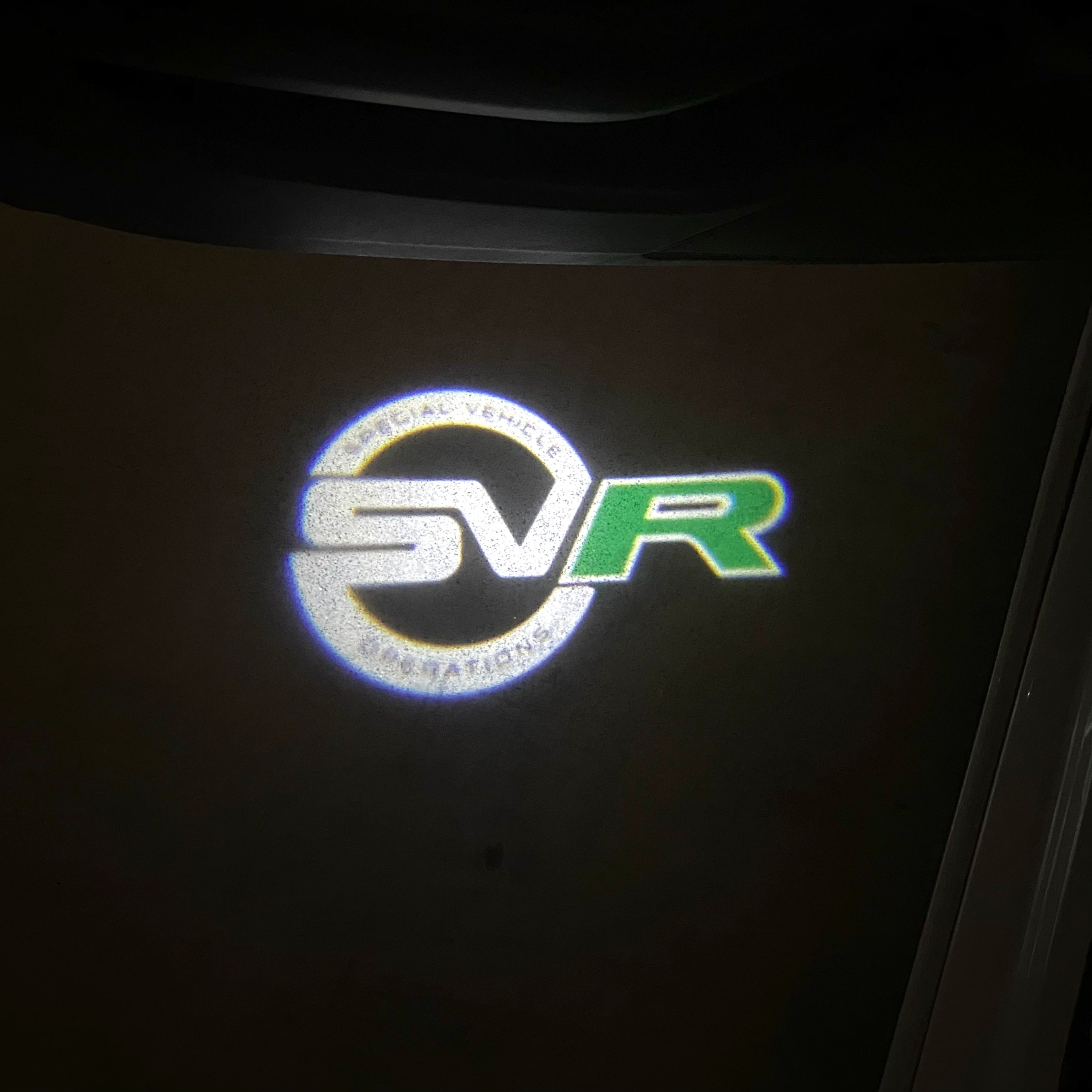 Land Rover LOGO PROJECROTR LIGHTS Nr.04 (الكمية 1 = 1 مجموعة / 2 أضواء باب)
