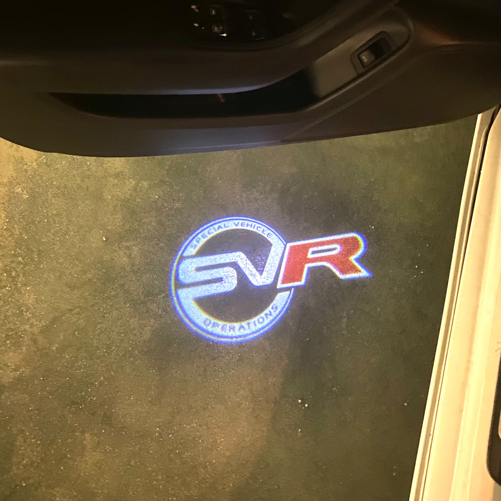 LUCI PROIETTORI LOGO Land Rover Nr.04 (quantità 1 = 1 set / 2 luci porta)