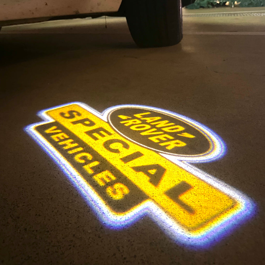 LUCES DE PROYECTOR CON LOGO Land Rover Nr.04 (cantidad 1 = 1 juegos / 2 luces de puerta)