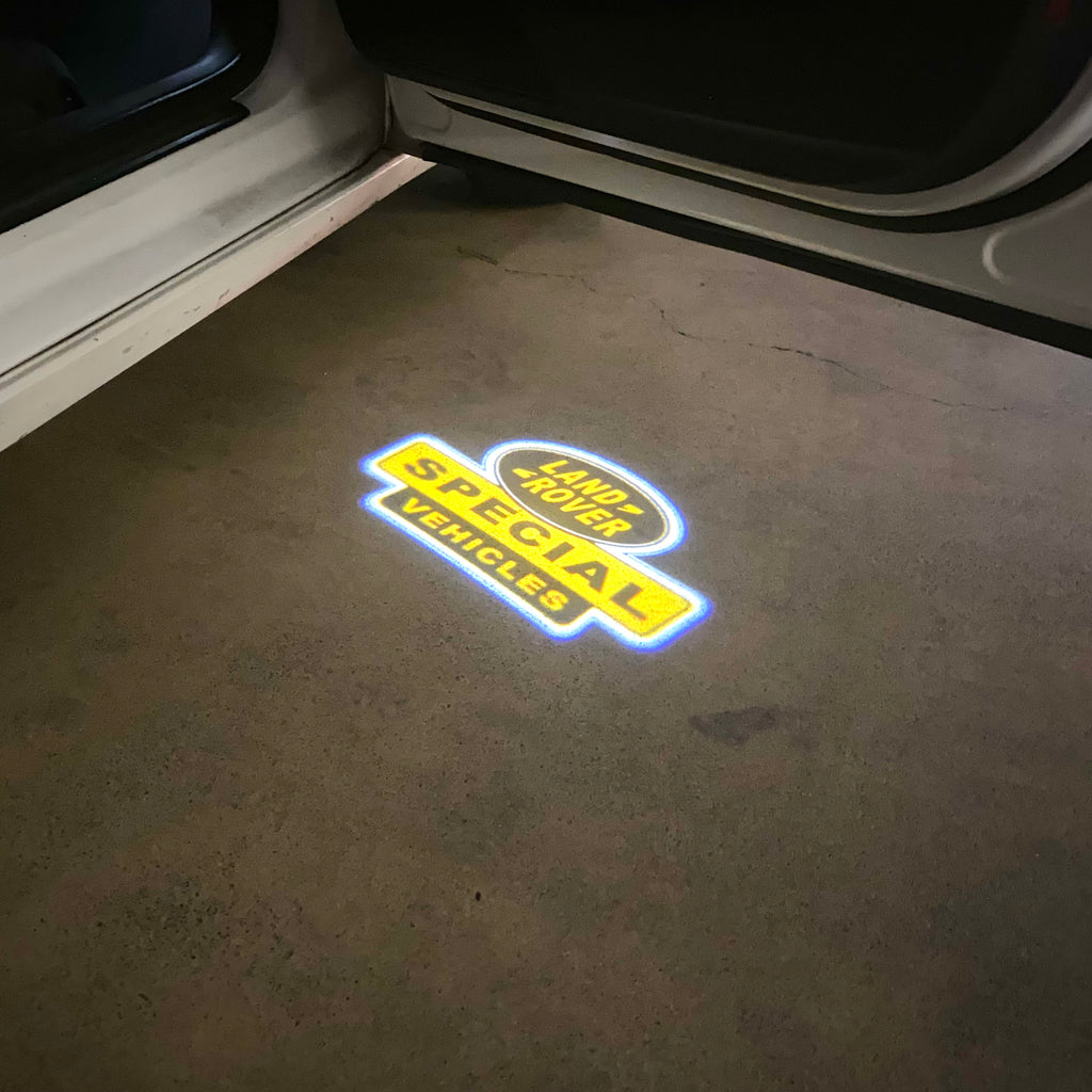 LUCES DE PROYECTOR CON LOGO Land Rover Nr.04 (cantidad 1 = 1 juegos / 2 luces de puerta)