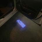 LUCI PROIETTORI LOGO SKODA Nr.102 (quantità 1 = 2 Logo Film / 2 luci porta)
