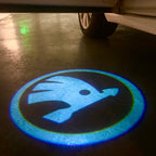SKODA LOGO PROJECTOR LIGHTS Nr.81 (Menge 1 = 2 Logo Film / 2 Türlichter)