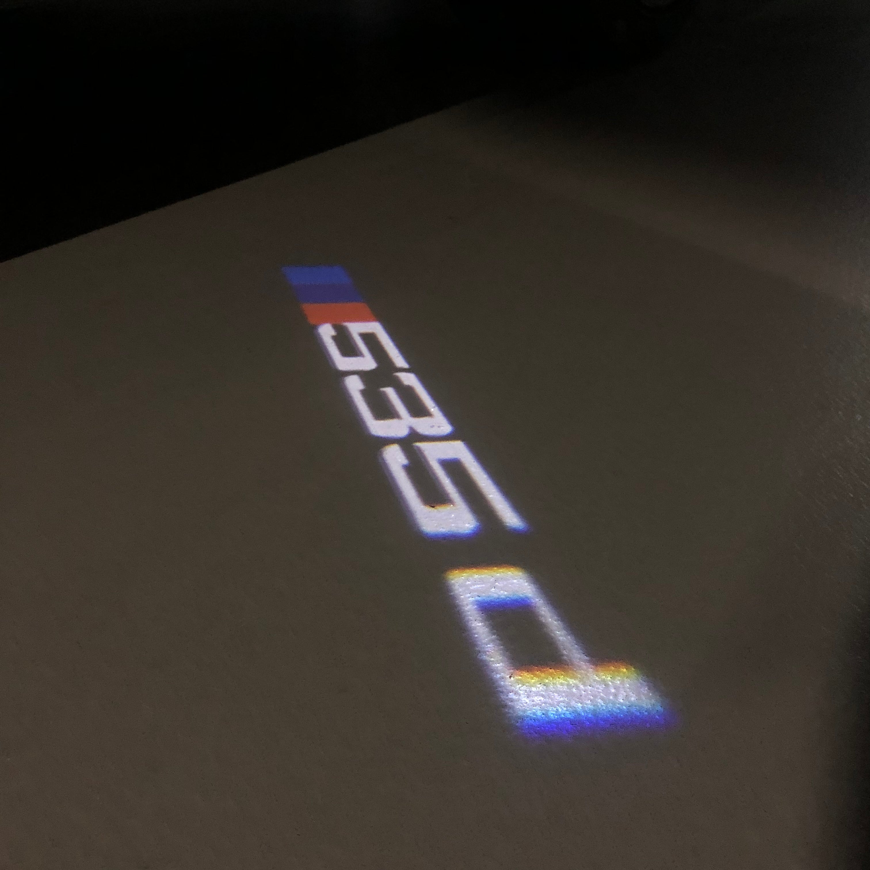LUCES DE PROYECTOR DEL LOGOTIPO BMW M3 Nr.24 (cantidad 1 = 1 juegos / 2 luces de puerta)