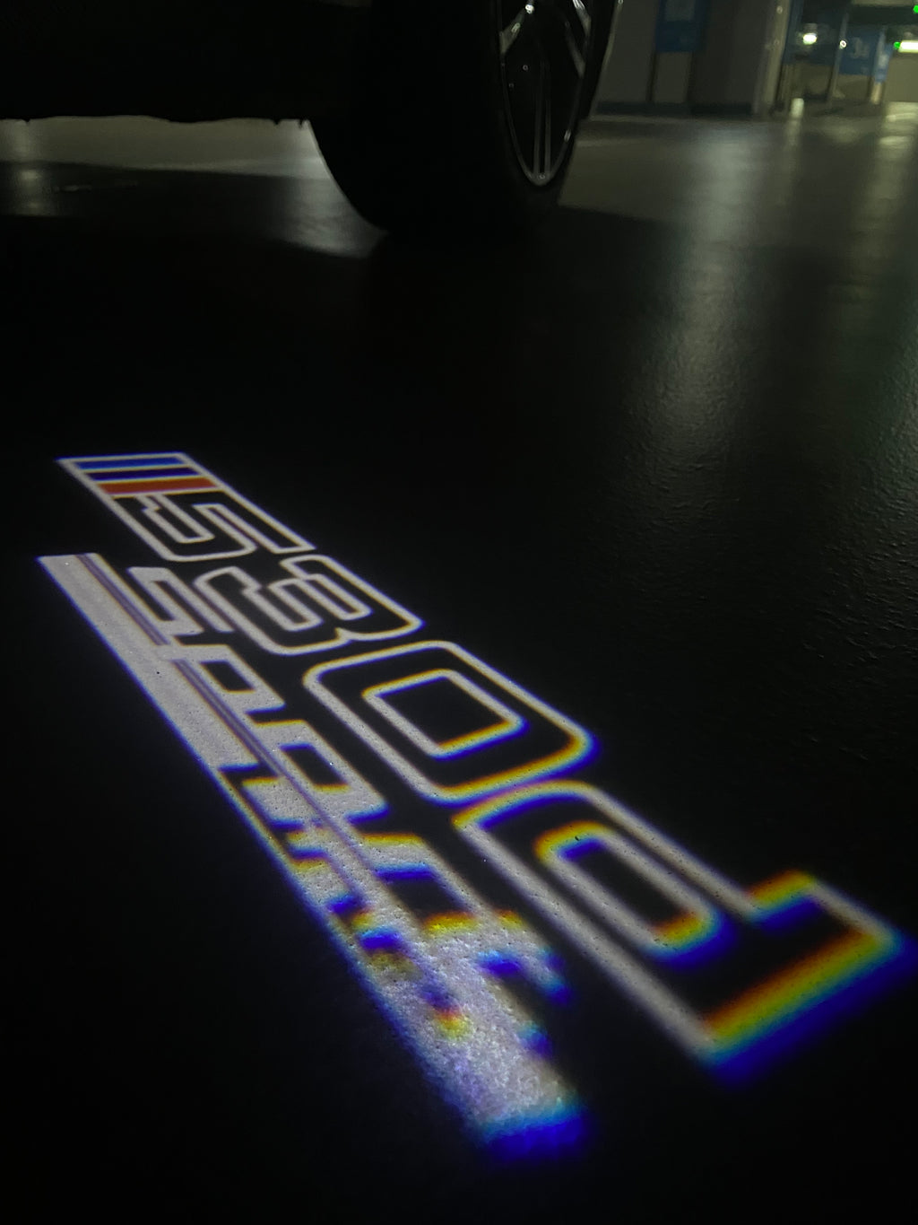 ÉCLAIRAGE DE PROJECTEUR BMW M3 LOGO Nr.24 (quantité 1 = 1 jeux / 2 feux de porte)