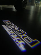 ÉCLAIRAGE DE PROJECTEUR BMW M3 LOGO Nr.24 (quantité 1 = 1 jeux / 2 feux de porte)