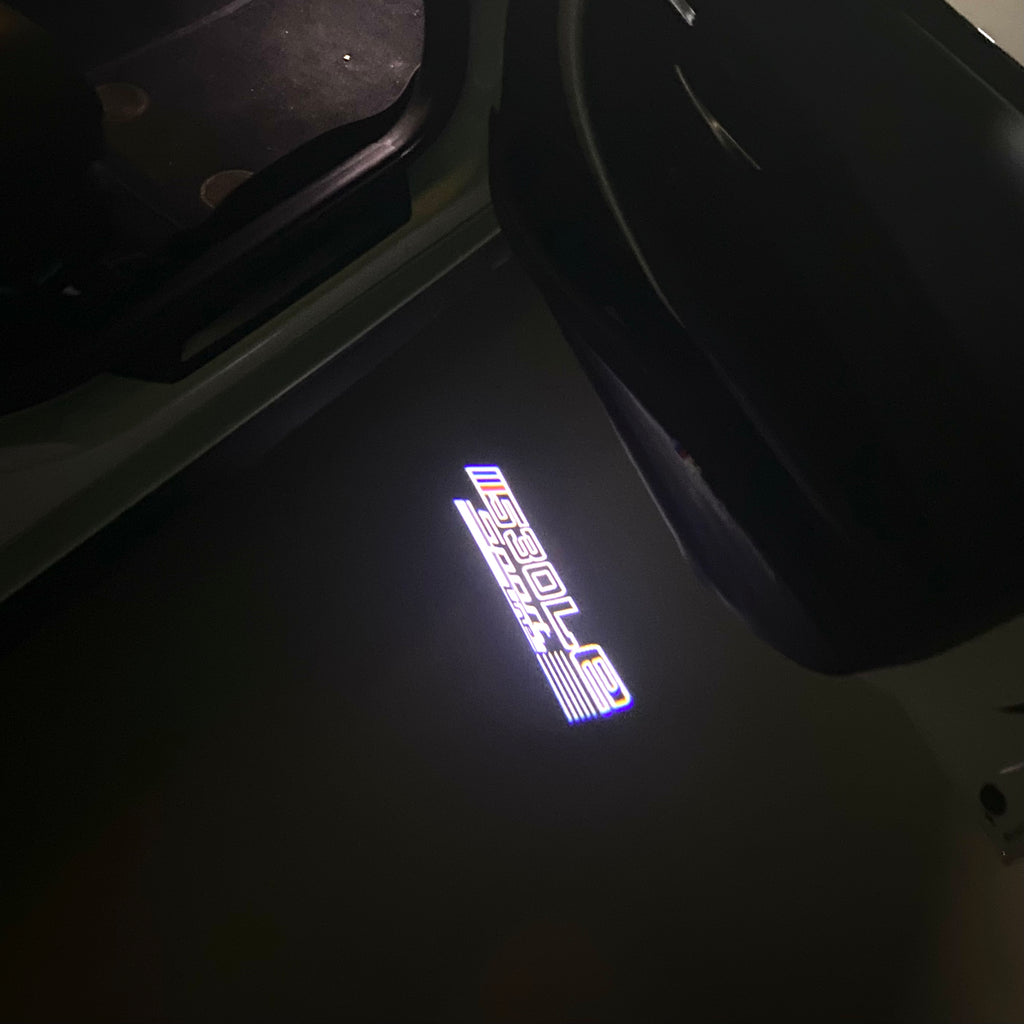 LUCES DE PROYECTOR DEL LOGOTIPO BMW M3 Nr.24 (cantidad 1 = 1 juegos / 2 luces de puerta)