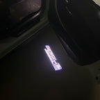 LUCES DE PROYECTOR DEL LOGOTIPO BMW M3 Nr.24 (cantidad 1 = 1 juegos / 2 luces de puerta)