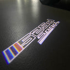 LUCES DE PROYECTOR DEL LOGOTIPO BMW M3 Nr.24 (cantidad 1 = 1 juegos / 2 luces de puerta)