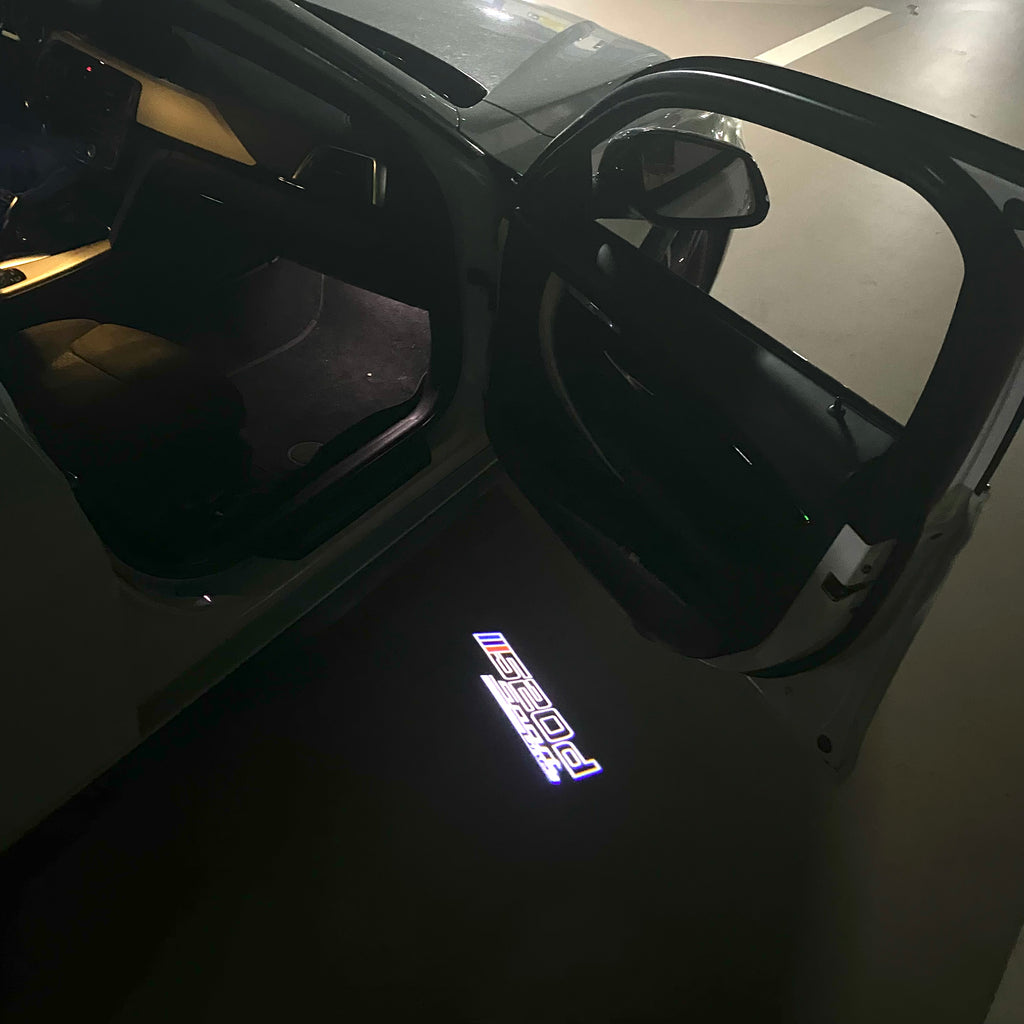 ÉCLAIRAGE DE PROJECTEUR BMW M3 LOGO Nr.24 (quantité 1 = 1 jeux / 2 feux de porte)