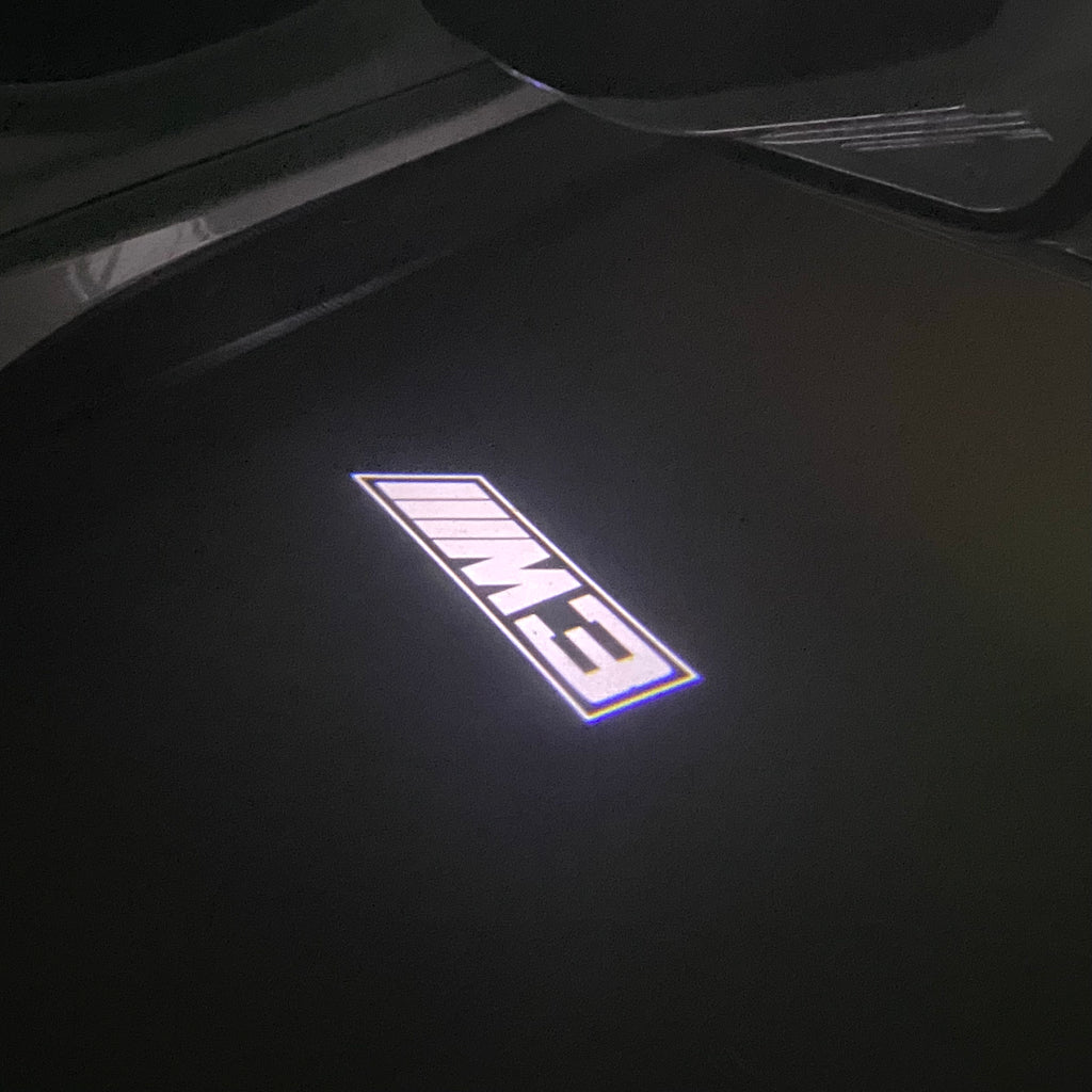 ÉCLAIRAGE DE PROJECTEUR BMW M3 LOGO Nr.24 (quantité 1 = 1 jeux / 2 feux de porte)