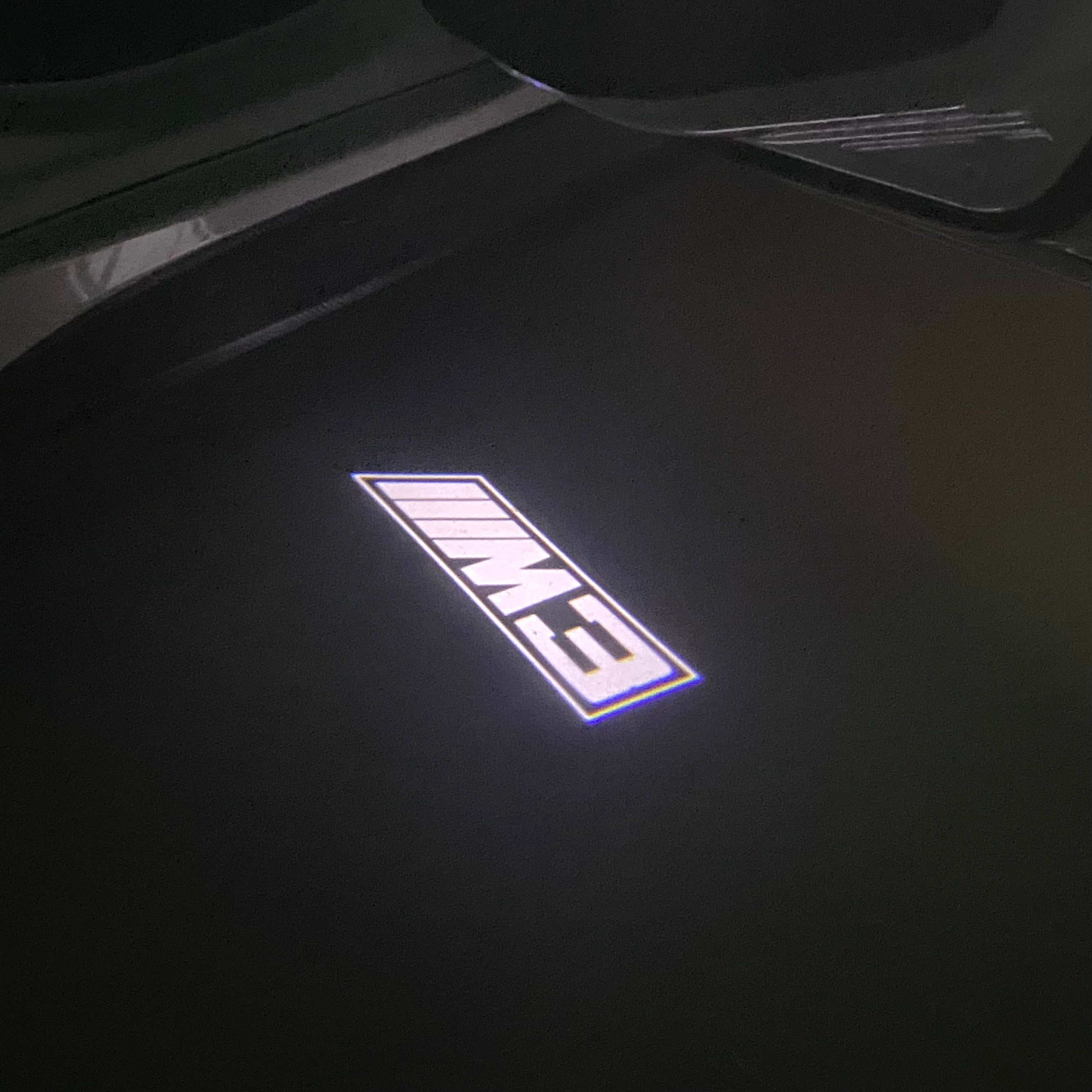 ÉCLAIRAGE DE PROJECTEUR BMW M3 LOGO Nr.24 (quantité 1 = 1 jeux / 2 feux de porte)