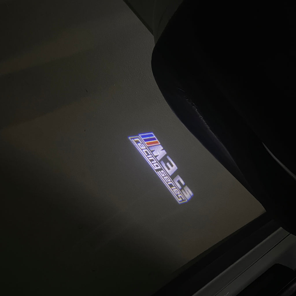 LUCES DE PROYECTOR DEL LOGOTIPO BMW M3 Nr.24 (cantidad 1 = 1 juegos / 2 luces de puerta)