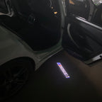 LUCES DE PROYECTOR DEL LOGOTIPO BMW M3 Nr.24 (cantidad 1 = 1 juegos / 2 luces de puerta)