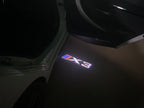 ÉCLAIRAGE DE PROJECTEUR BMW M3 LOGO Nr.24 (quantité 1 = 1 jeux / 2 feux de porte)
