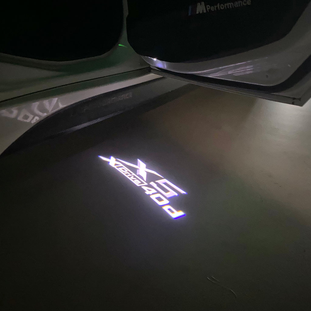 LUCES DE PROYECTOR DEL LOGOTIPO BMW M3 Nr.24 (cantidad 1 = 1 juegos / 2 luces de puerta)