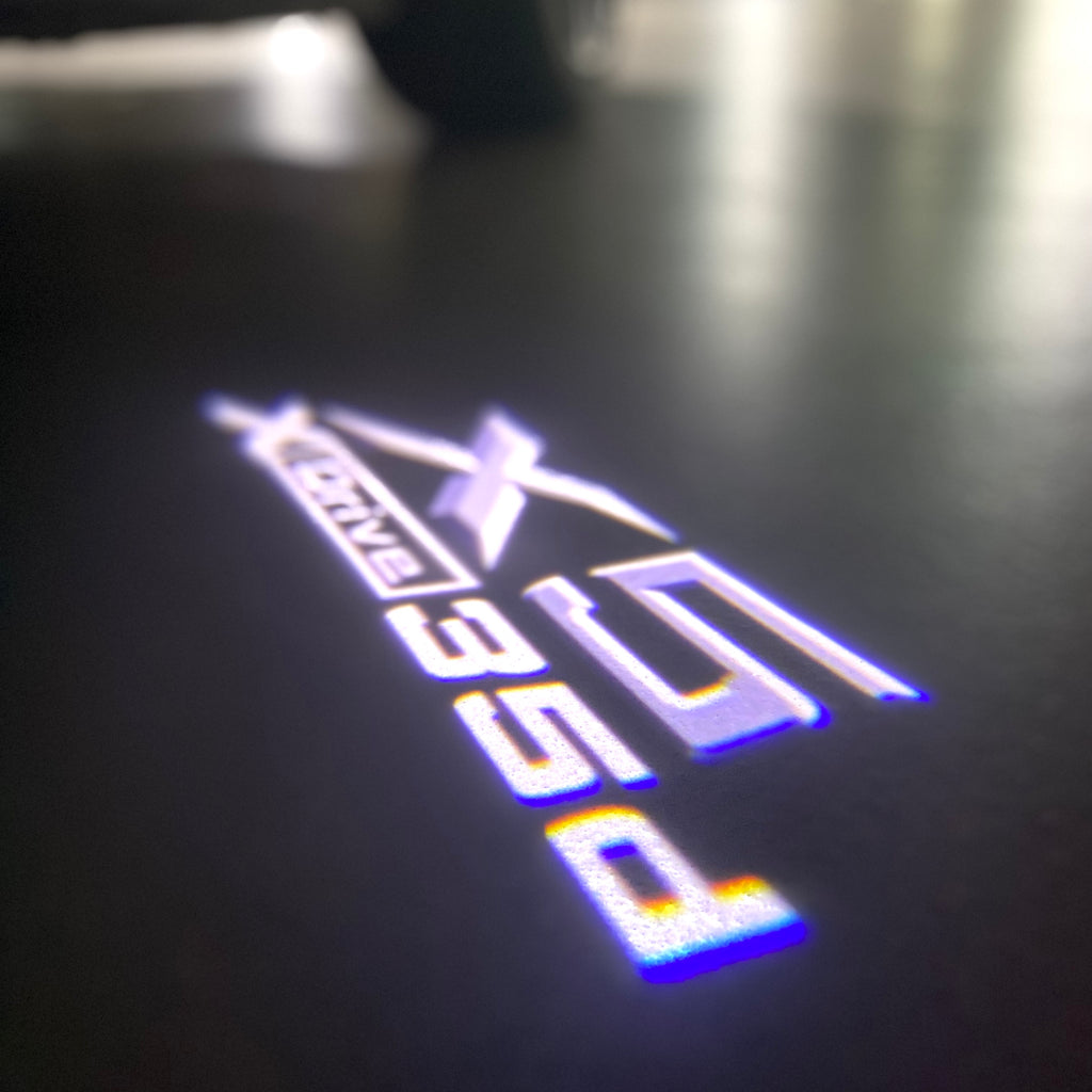 BMW M3 LOGO PROJECTOR LIGHTS Nr.24 (الكمية 1 = 1 مجموعة / 2 أضواء باب)