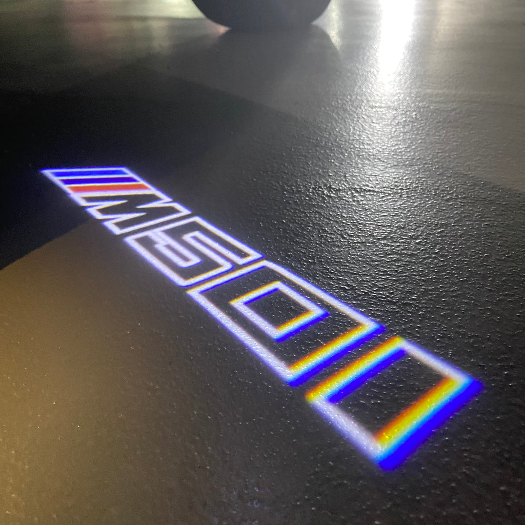 ÉCLAIRAGE DE PROJECTEUR BMW M3 LOGO Nr.24 (quantité 1 = 1 jeux / 2 feux de porte)