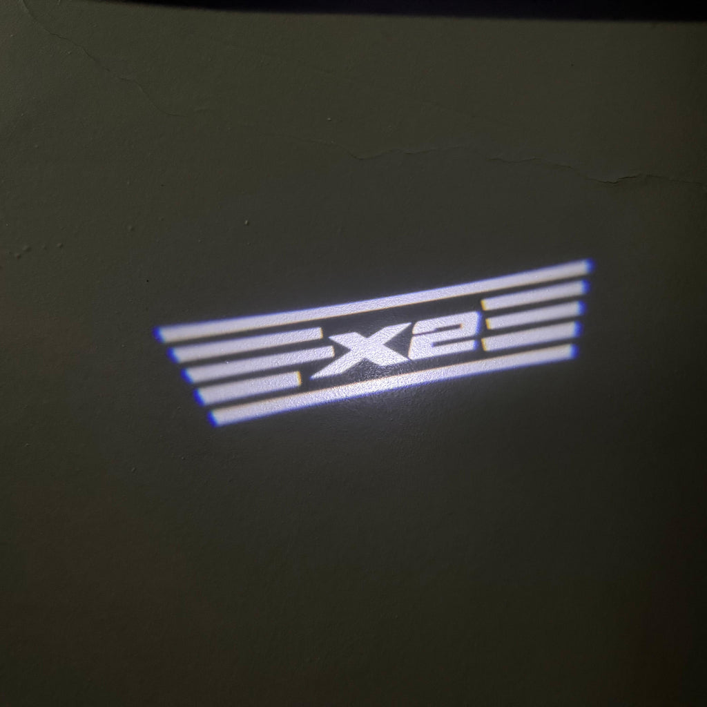 LUCES DE PROYECTOR DEL LOGOTIPO BMW M3 Nr.24 (cantidad 1 = 1 juegos / 2 luces de puerta)