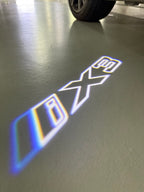 ÉCLAIRAGE DE PROJECTEUR BMW M3 LOGO Nr.24 (quantité 1 = 1 jeux / 2 feux de porte)