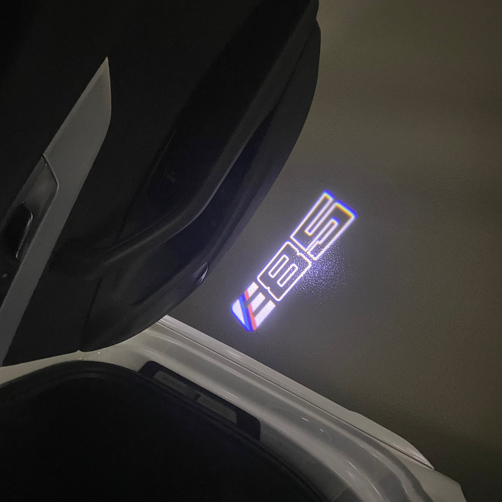 ÉCLAIRAGE DE PROJECTEUR BMW M3 LOGO Nr.24 (quantité 1 = 1 jeux / 2 feux de porte)