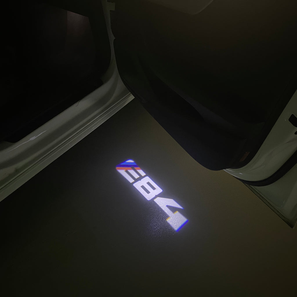 LUCES DE PROYECTOR DEL LOGOTIPO BMW M3 Nr.24 (cantidad 1 = 1 juegos / 2 luces de puerta)