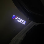 ÉCLAIRAGE DE PROJECTEUR BMW M3 LOGO Nr.24 (quantité 1 = 1 jeux / 2 feux de porte)