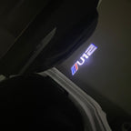 ÉCLAIRAGE DE PROJECTEUR BMW M3 LOGO Nr.24 (quantité 1 = 1 jeux / 2 feux de porte)