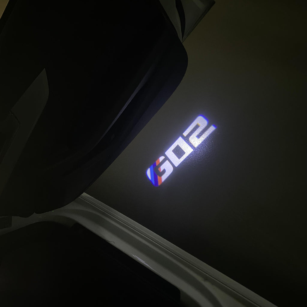 LUCES DE PROYECTOR DEL LOGOTIPO BMW M3 Nr.24 (cantidad 1 = 1 juegos / 2 luces de puerta)