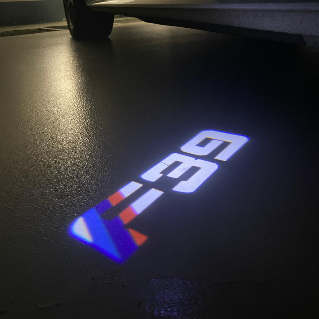 ÉCLAIRAGE DE PROJECTEUR BMW M3 LOGO Nr.24 (quantité 1 = 1 jeux / 2 feux de porte)